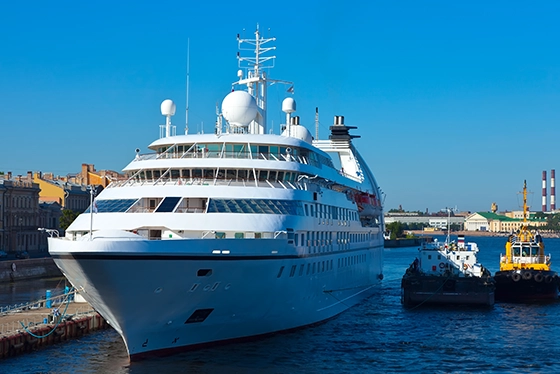 Luxury Cruise Ship Docked in Sunny Harbor, Promoting Cruise Travel Agency Ohio
